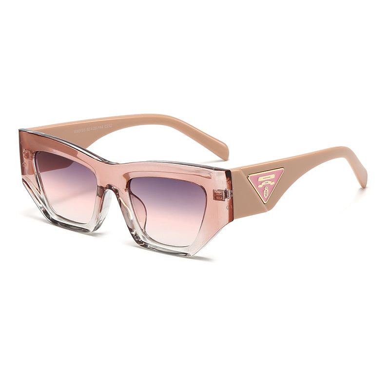 Dame Designer solbrille med moderne, geometrisk ramme Luvikno