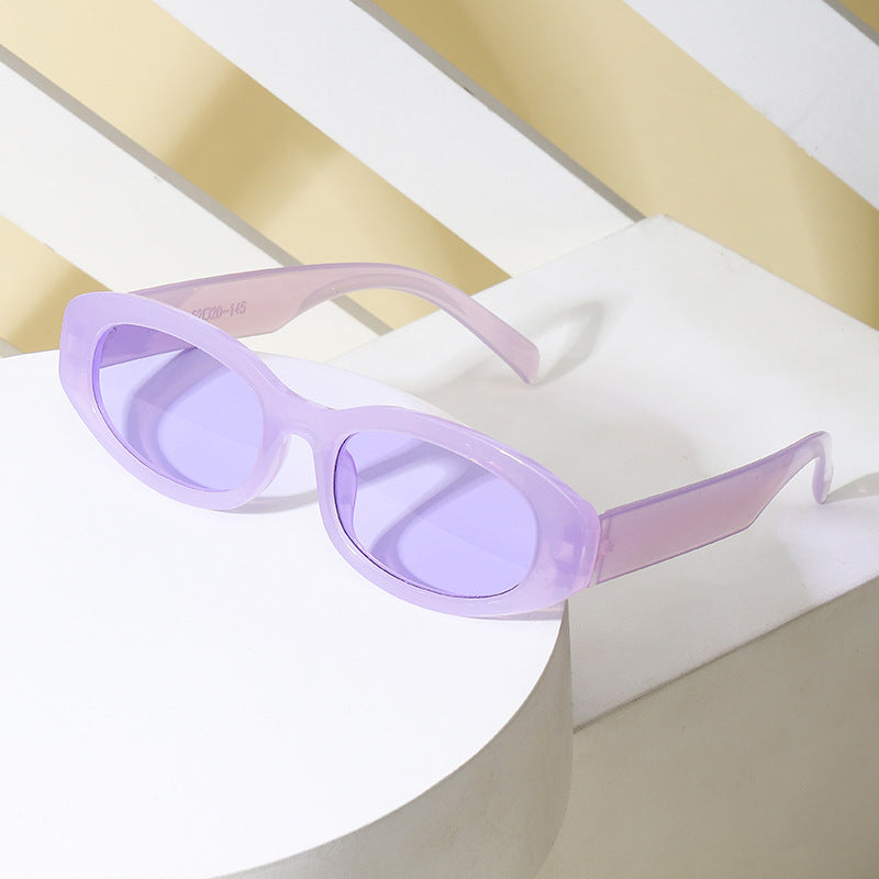 Dame modiske solbriller i minimalistisk ovaldesign Luvikno