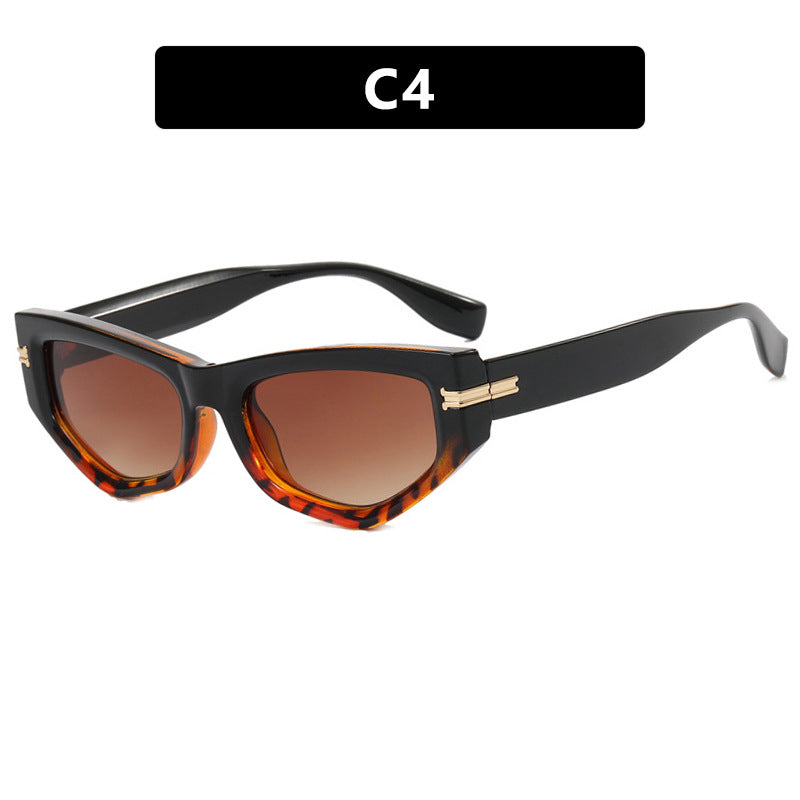 Dame geometrisk solbrille med bøyd ramme og beskyttende UV-filter Luvikno