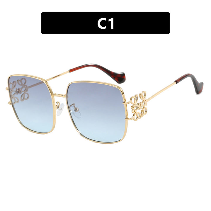 Dame kvadratisk solbrille med filigran design og luksuriøs metallramme Luvikno