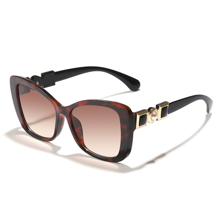 Dame Cat-Eye solbriller med elegant metallisk dekorasjon Luvikno
