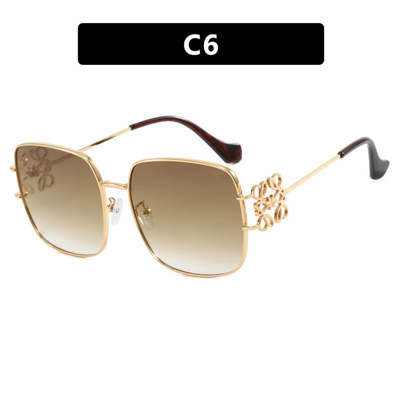 Dame kvadratisk solbrille med filigran design og luksuriøs metallramme Luvikno