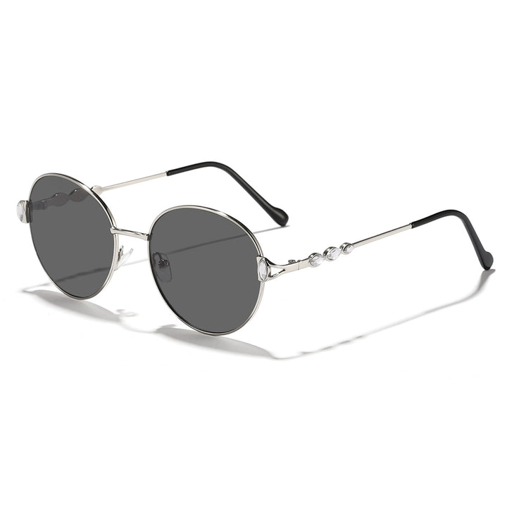 Dame rund solbrille med elegant metallramme og speilvendte glass Luvikno