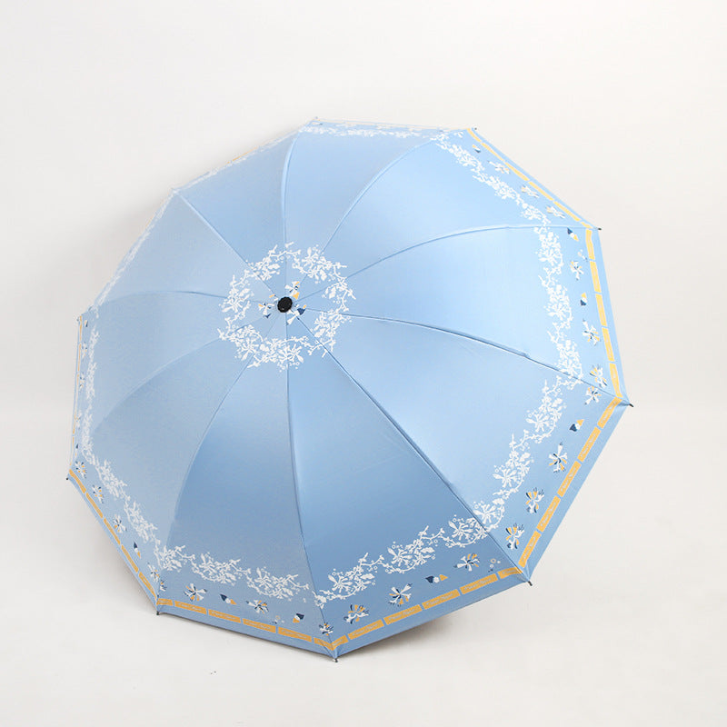 Kvinnens elegante sammenleggbare paraply med blomsterdesign Luvikno