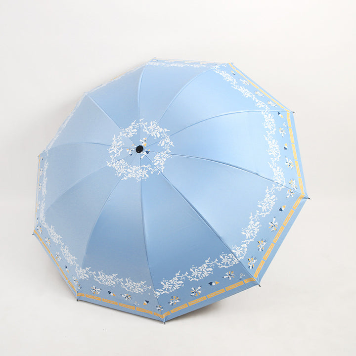 Kvinnens elegante sammenleggbare paraply med blomsterdesign Luvikno