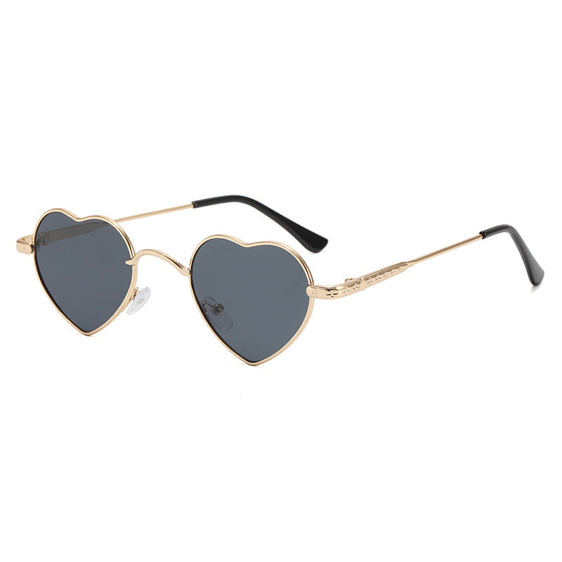 Damer hjerteformet solbrille med filigran metallramme Luvikno