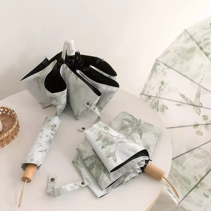 Damer Faltparaply med botanisk trykkdesign Luvikno