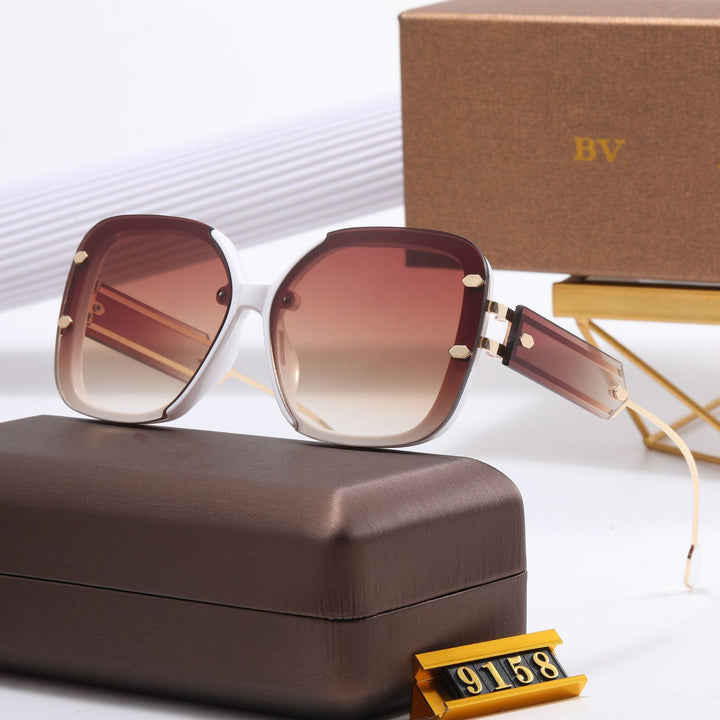 Dame designer-solbrille med ekstravagant ramme Luvikno