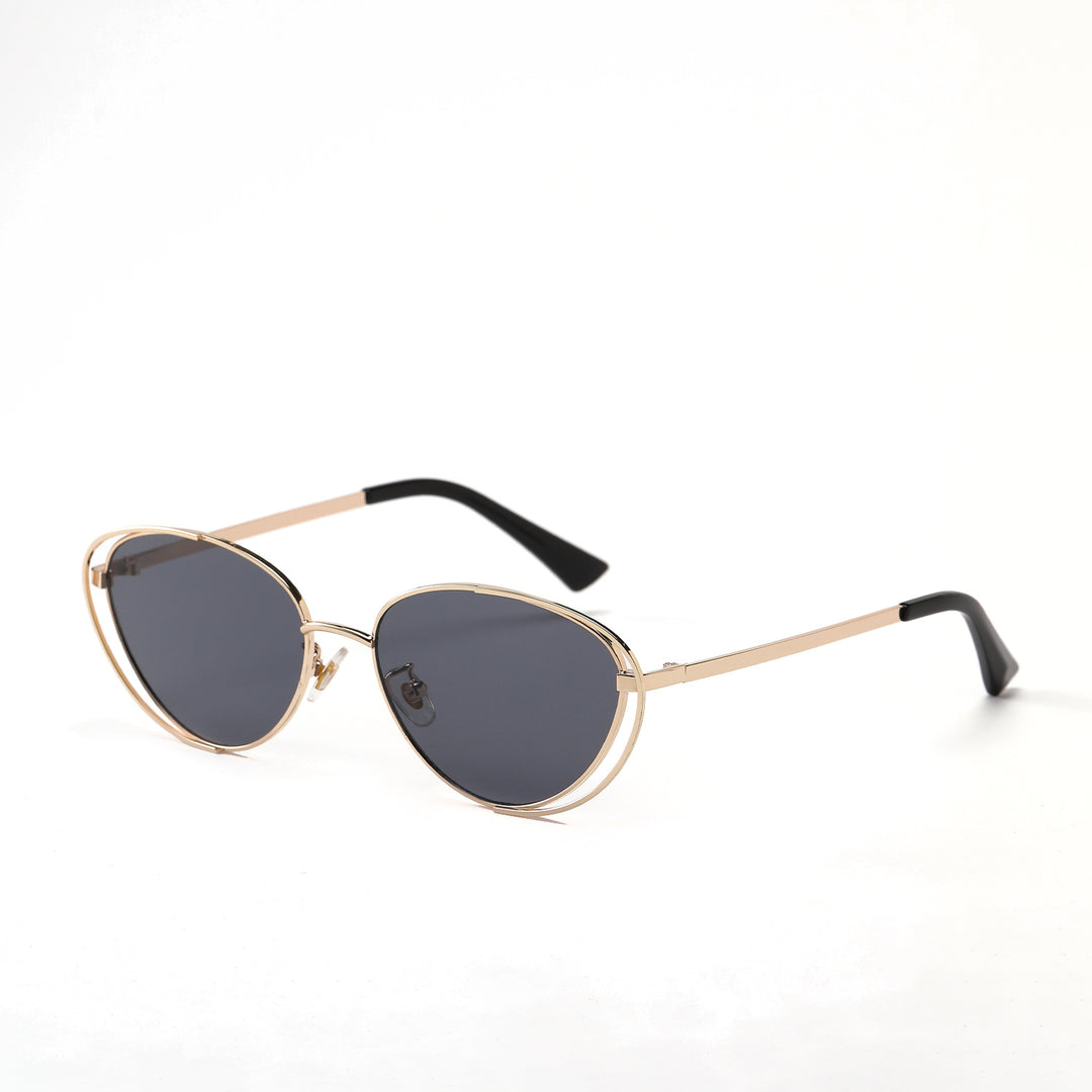 Dame geometrisk solbrille med rødt glass og elegant metallramme Luvikno