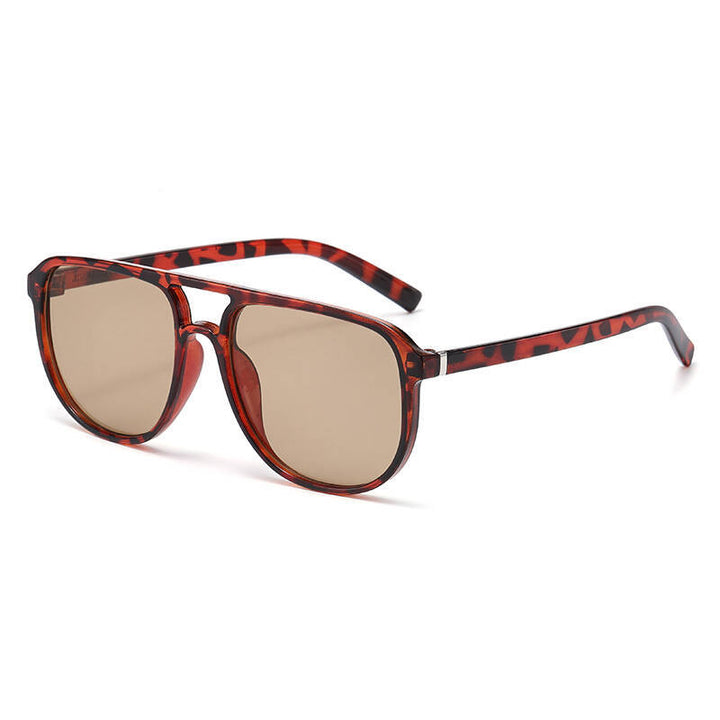 Dame moteriktig solbrille i elegant kvadratdesign Luvikno
