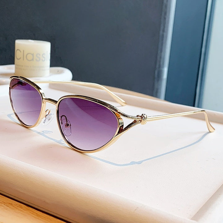 Dame Cat-Eye solbriller med elegant gullramme og polarisert glass Luvikno
