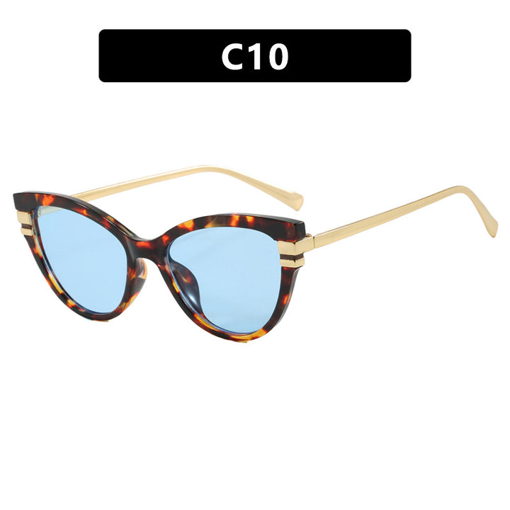 Dame Cat-Eye solbriller med elegant plastramme og gullaccentuer Luvikno