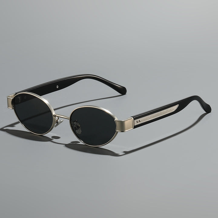 Dame solbrille i moderne, ovale ramme med harmonisk fargekombinasjon Luvikno