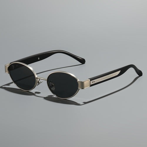 Dame solbrille i moderne, ovale ramme med harmonisk fargekombinasjon Luvikno