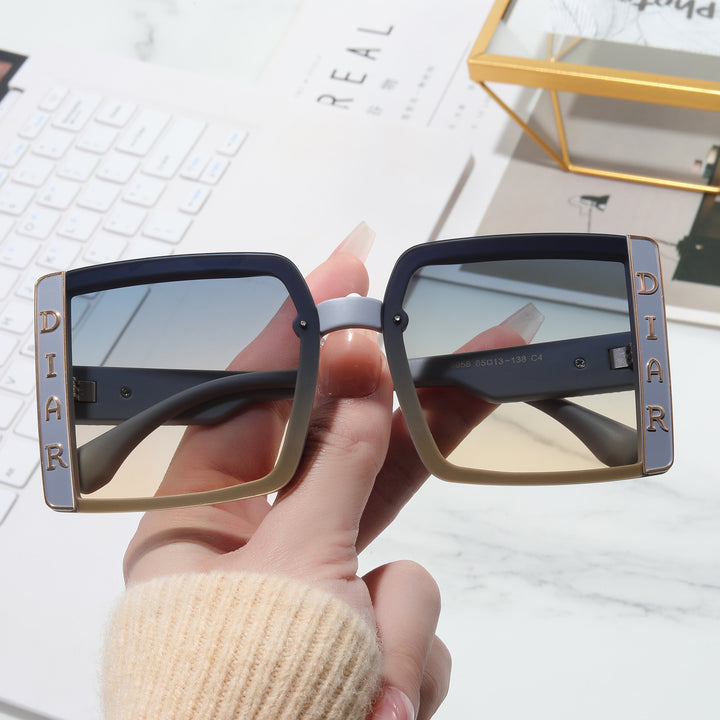 Dame solbrille i moderne kvadratisk design Luvikno