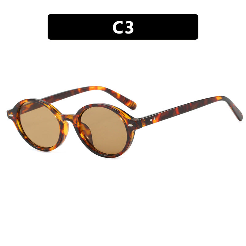 Dame rund solbrille med moderne design og polariserte glass Luvikno