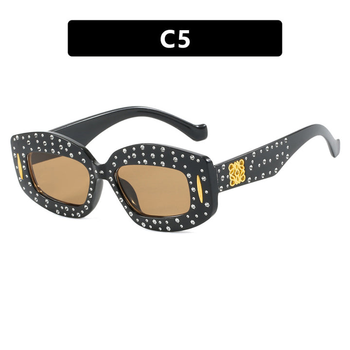Dame moteriktig solbrille med glamorøs strass-dekor Luvikno