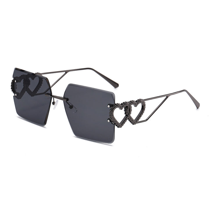 Dame moteriktig solbrille med trendy hjerte-design Luvikno