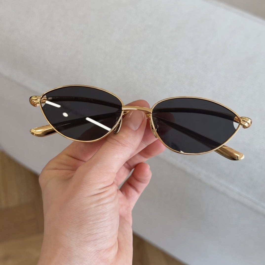 Dame Designer-solbriller med elegant metallramme og beskyttende glass Luvikno