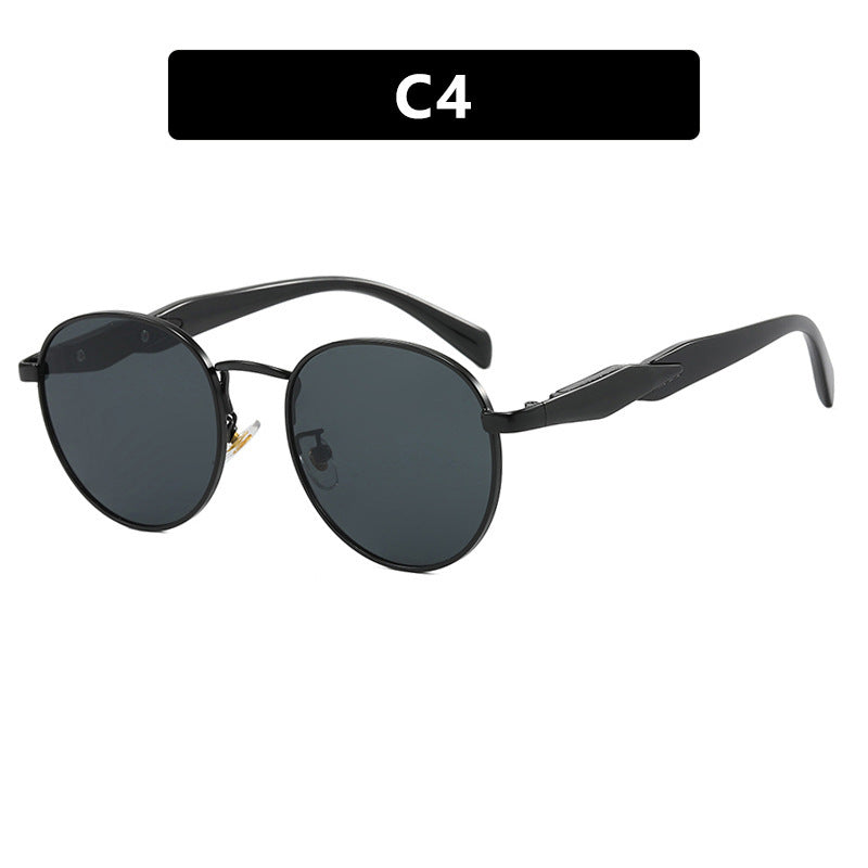 Dame rund solbrille med elegant, gullramme og UV-beskyttelse Luvikno