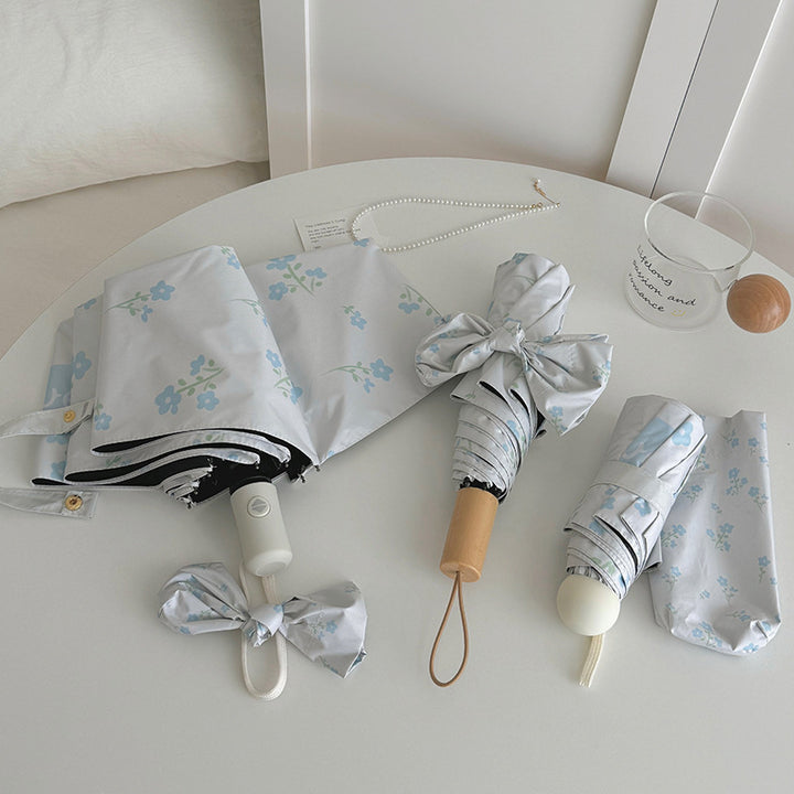 Damer Faltende Paraply med stilfullt blomsterdesign Luvikno