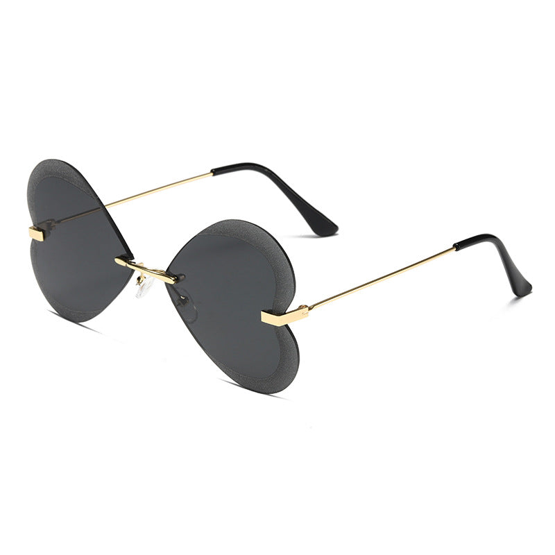 Kvinnelige hjerteformede solbriller i trendy design Luvikno