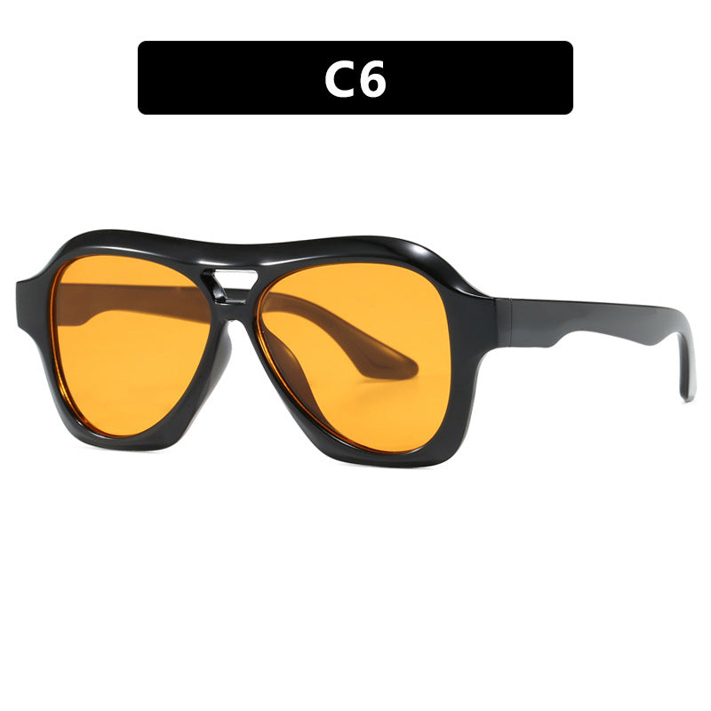 Dame moterik solbrille i innovativ design med bred ramme Luvikno