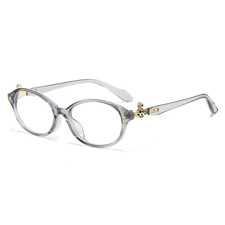 Dame motekunstig brille i elegant ova-design med gyldne aksenter Luvikno
