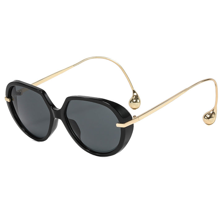 Dame cat-eye solbriller med gyldne detaljer og stilig ramme Luvikno