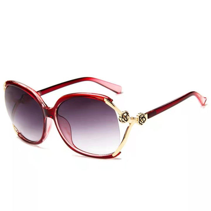 Dame elegante oversized solbrille med gyldne aksenter Luvikno