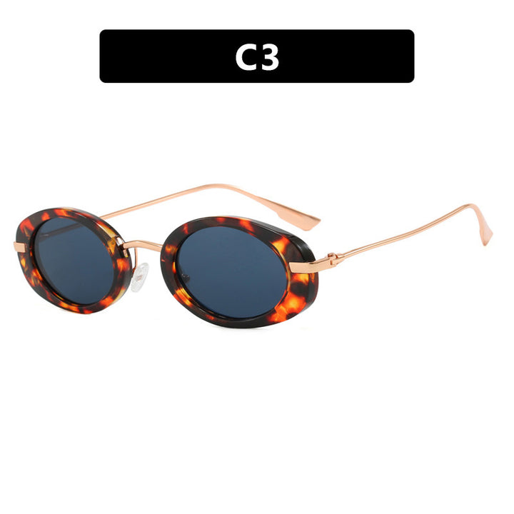 Dame moteriktig solbrille i elegant ovalt design Luvikno