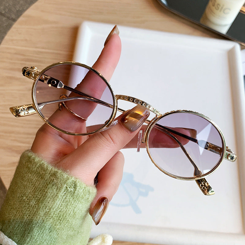 Dame Elegant solbrille med filigran detaljer Luvikno