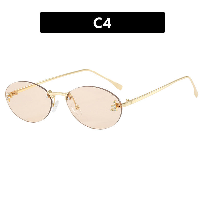 Dame mote trendy solbriller med elegante, runde glass og filigran metallramme Luvikno