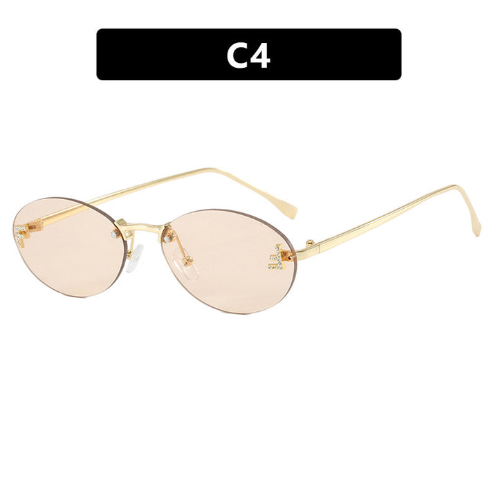 Dame mote trendy solbriller med elegante, runde glass og filigran metallramme Luvikno