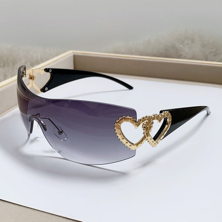 Dame designer-solbrille med luksuriøs hjerte-akseent Luvikno