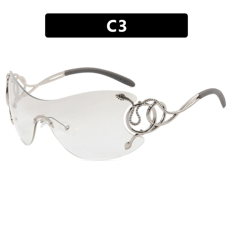 Dame futuristisk solbrille med lekent design Luvikno