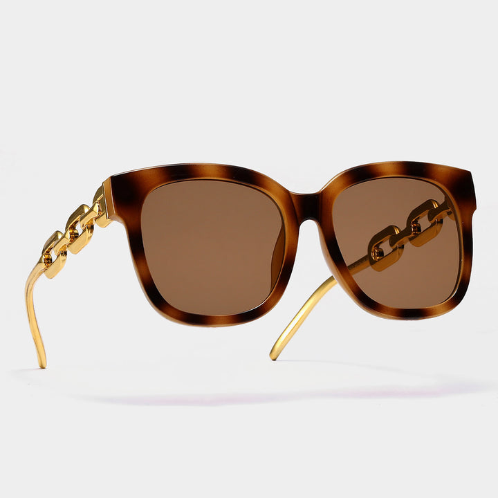 Dame moteriktig oversized solbrille med luksuriøs kjedeinnramming Luvikno