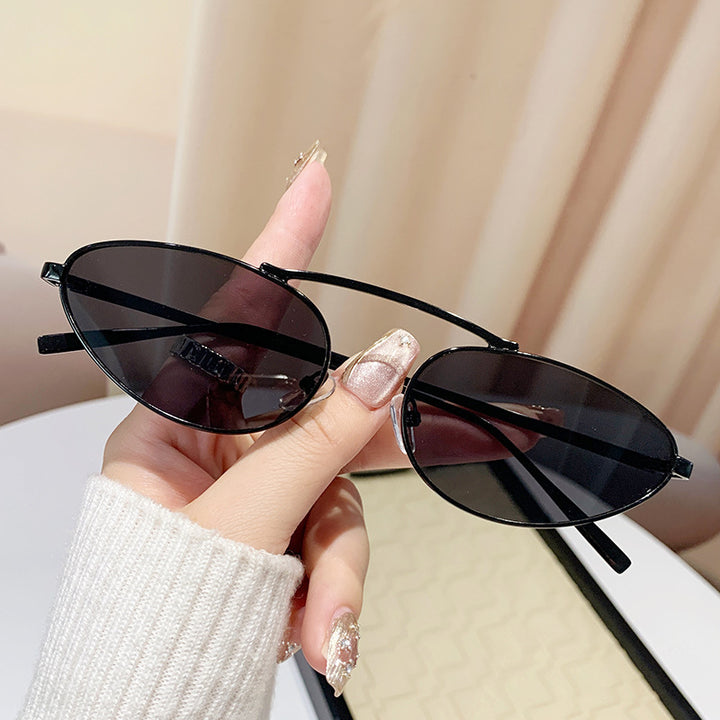 Dame modische solbrille i elegant ovaldesign Luvikno