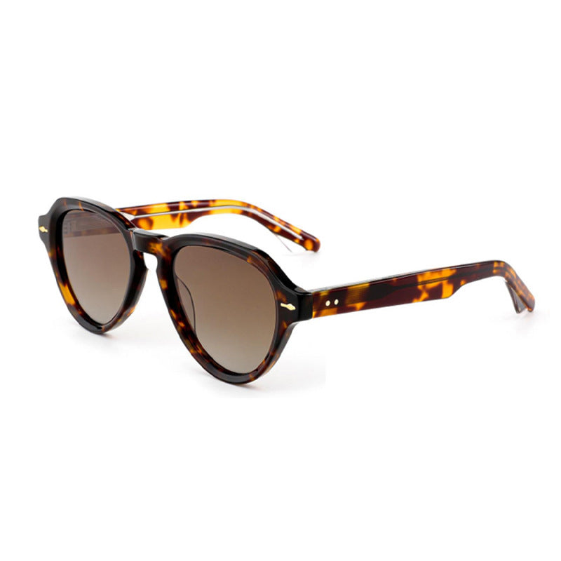Damer moterik solbrille i elegant, rund design med polariserte linser Luvikno