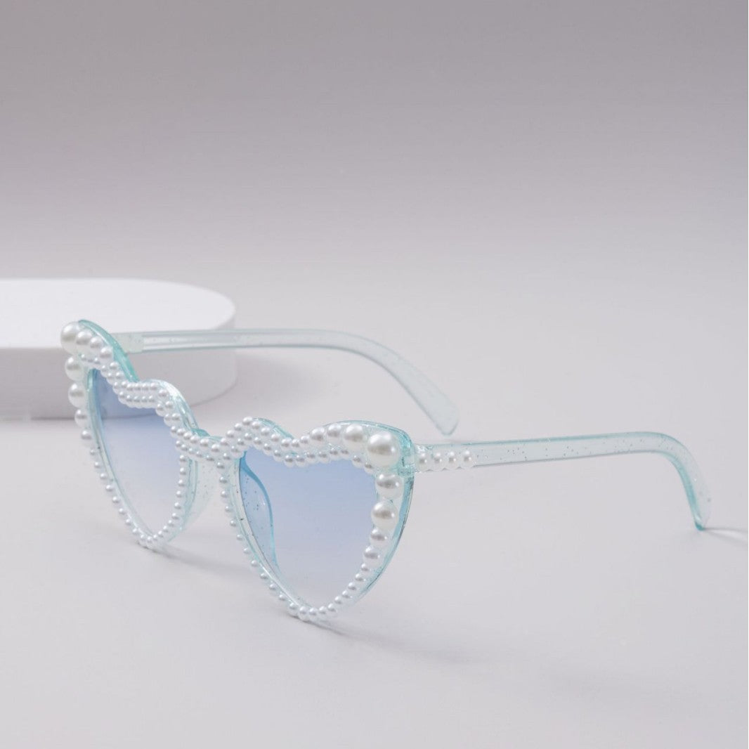 Dame designer solbrille med perleinnramming fra Luvikno