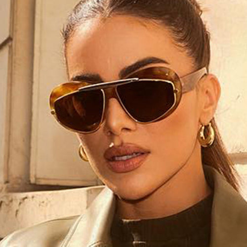 Dame futuristisk solbrille med elegant ramme Luvikno