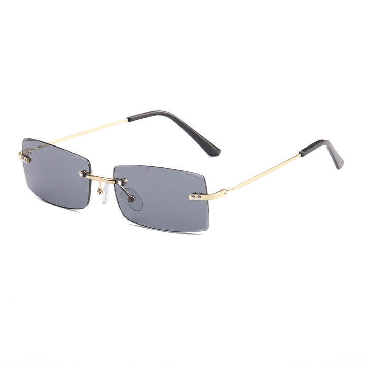 Dame moteriktig solbrille med elegant, filigranramme Luvikno