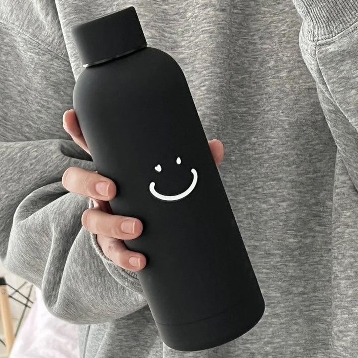 Dame isoleringsflaske med lyst smilendesign Luvikno