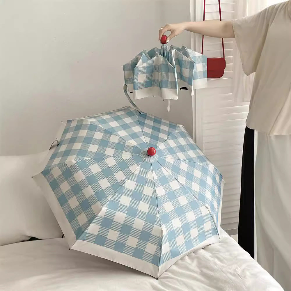 Dame sammenleggbart paraply med spesiell design Luvikno