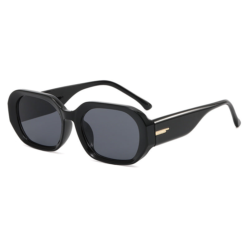 Dame moteriktig geometrisk solbrille med robust design Luvikno