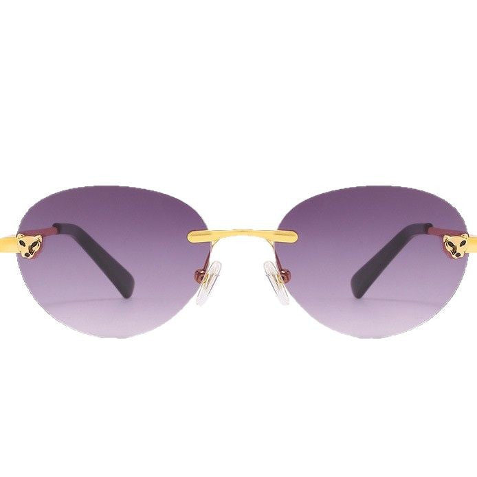 Dame oval solbrille med luksuriøse metalliske aksenter Luvikno