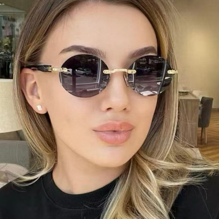 Dame rund solbrille med elegant treinnramme og UV-beskyttelse Luvikno