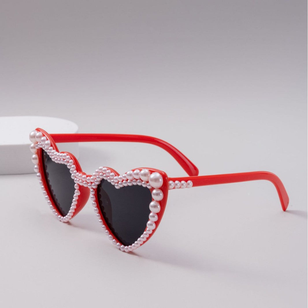 Dame designer solbrille med perleinnramming fra Luvikno