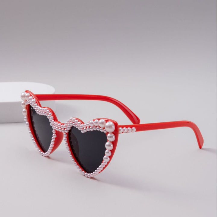 Dame designer solbrille med perleinnramming fra Luvikno