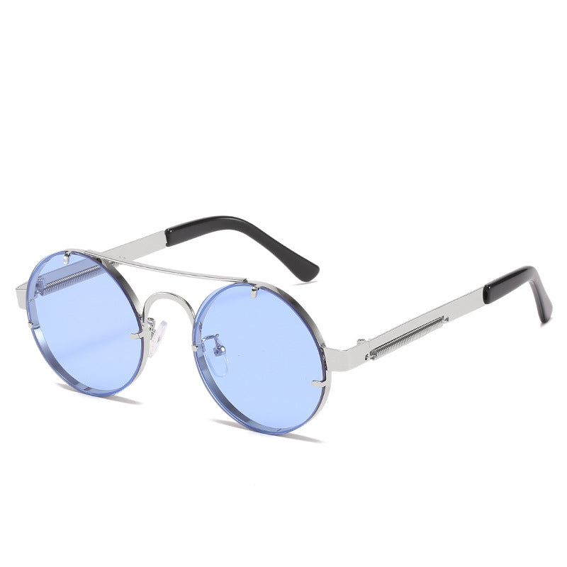 Dame rund designer solbrille med innovativ metallramme og beskyttende linser Luvikno